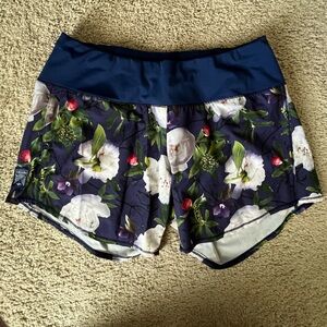 Oiselle long Roga shorts- purple floral pattern 6” inseam